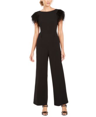 black jumpsuit with feathers