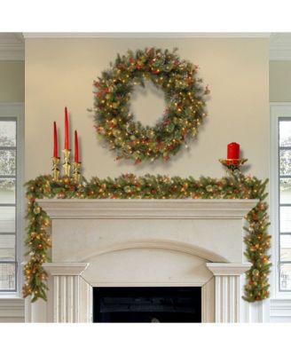 National Tree Company 30" Wintry Pine Wreath with Cones, Red Berries, Snowflakes and 100 Clear Lights