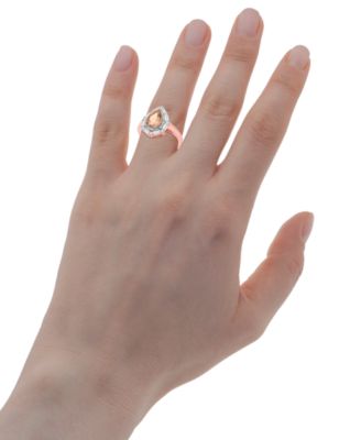 Swiss Blue Topaz (3-3/8 ct. t.w.) & White Topaz (1/6 ct. t.w.) Teardrop Halo Ring in Sterling Silver (Also in Amethyst & Morganite)