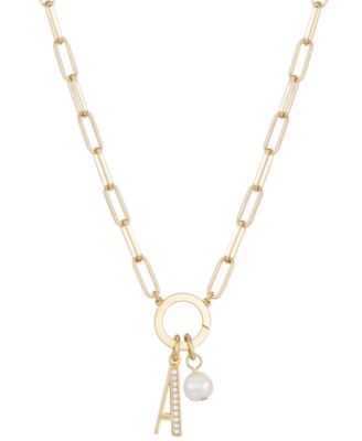 Photo 1 of UNWRITTEN Cubic Zirconia Initial & Freshwater Pearl 18" Pendant Necklace in Gold Plate
Freshwater pearl: 6mm
Set in fine silver plate or 14k gold flash-plated metal; cubic zirconia
Approx. length: 18"; approx. drop: 3/4"
Spring ring closure