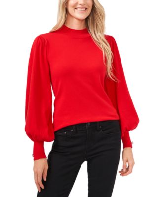 red sweater with puff sleeves