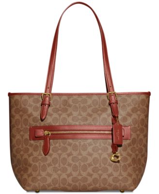 Photo 1 of COACH Signature Coated Canvas Taylor Tote with C Dangle Charm