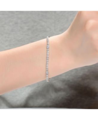 Sterling Silver with Rhodium Plated Clear Round and Oval Cubic Zirconia Bezel Set Tennis Bracelet