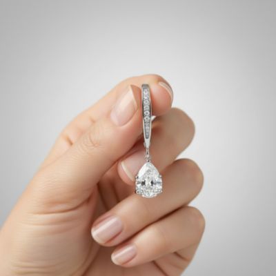 Elegant Sterling Silver Dangling Pear-Shaped Cubic Zirconia Earrings