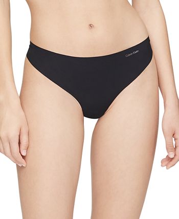 Calvin Klein Women's Invisibles Seamless Thong Panties, Multipack,  Black/Beechwood/Star Stamp_Beechwood, X-Small : : Clothing, Shoes  & Accessories
