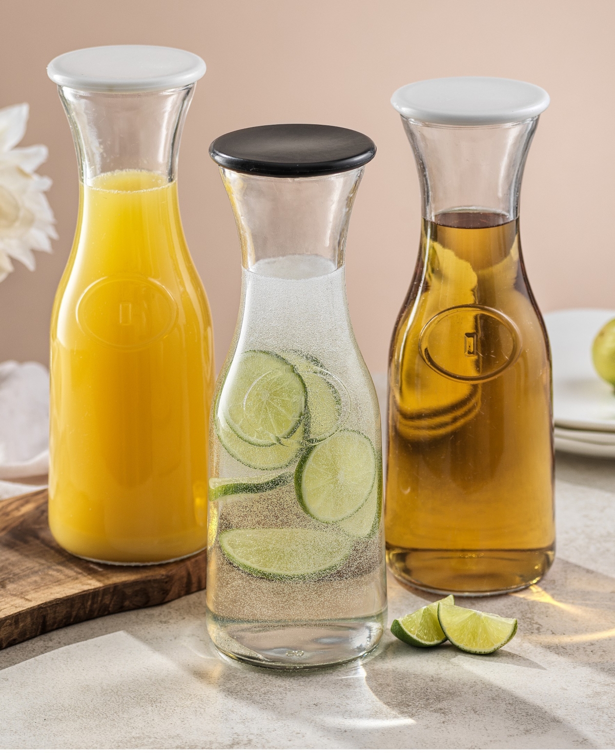 JoyJolt Hali Glass Carafe Bottle Pitcher with 8 Lids, Set of 4