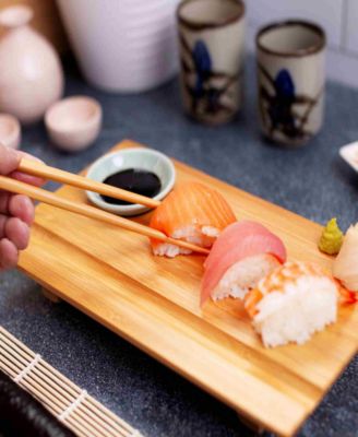 3pc Burnished Real Sushi Board Set. 3pc set includes a real sushi board, ceramic soy sauce dish, pair of chopsticks.
