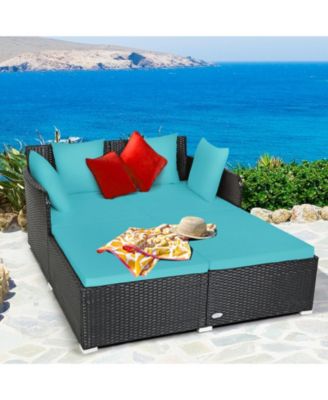 Spacious Outdoor Rattan Daybed with Upholstered Cushions and Pillows