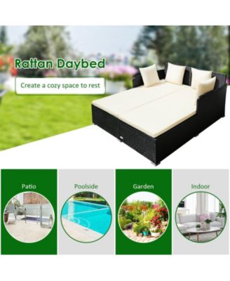 Spacious Outdoor Rattan Daybed with Upholstered Cushions and Pillows
