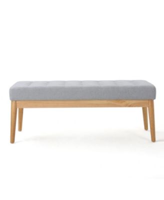 tufted upholstered design with mid-century modern charm is offered as a stylish bench