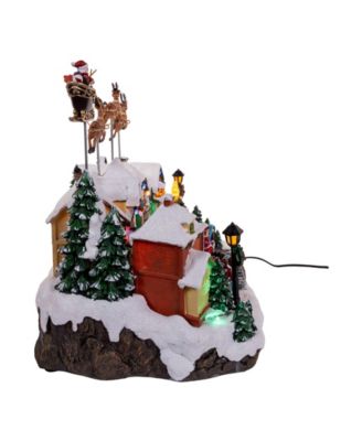 7.3-Inch Battery Operated Multicolor LED Lighted Musical Santa and Sleigh Table Piece