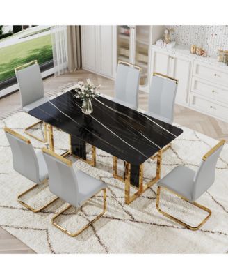 Table and chair set. Modern dining table with MDF top and beautiful MDF legs. Equipped with comfortable PU chairs and metal legs. Suitable for a wide range of decorative styles.