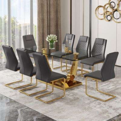 Table and chair set.Modern rectangular dining table with Transparent tempered glass tabletop and gold plated metal legs.Paired with 8 comfortable chairs with PU seats and golden metal legs.