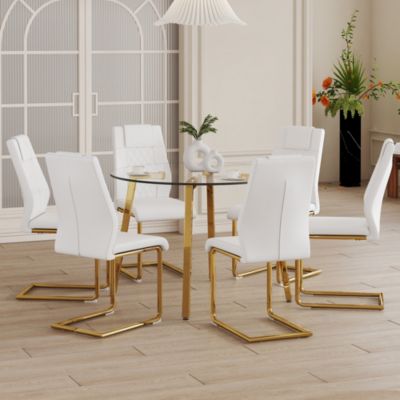 Table and chair set.A Modern Minimalist Style Round Clear Tempered Glass Table with Metal Legs.Paired with white chairs with Modern PU Leather High Back Upholstered and C-Tube Golden Legs.
