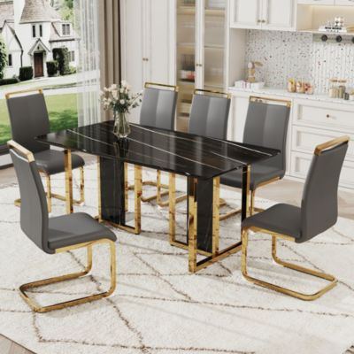 Table and chair set. Modern dining table with MDF top and beautiful MDF legs. Equipped with comfortable PU chairs and metal legs. Suitable for a wide range of decorative styles.