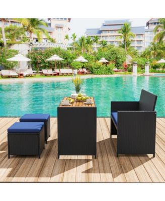 4 Piece Outdoor Dining Set with Wood Topped Dining Table Rattan Loveseat Chair and 2 Ottomans
