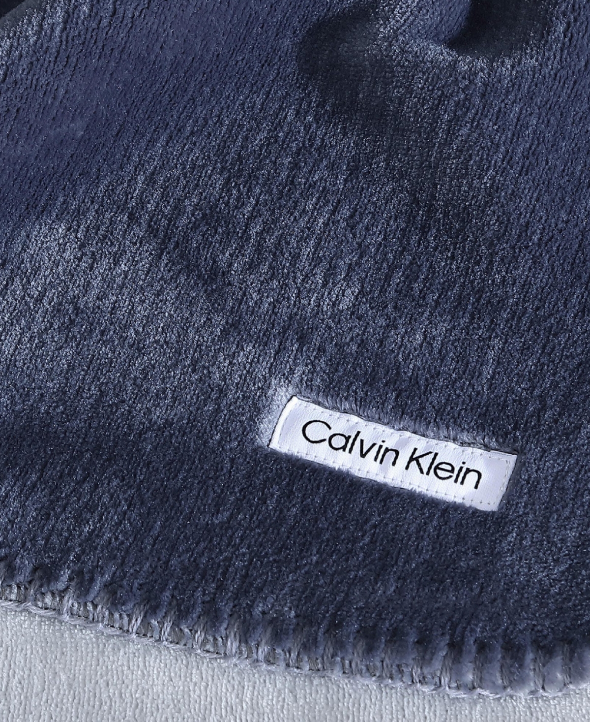Calvin Klein Modern Solid Reversible Throw Blanket, 70" X 50" In Slate Blue,dawn Blue