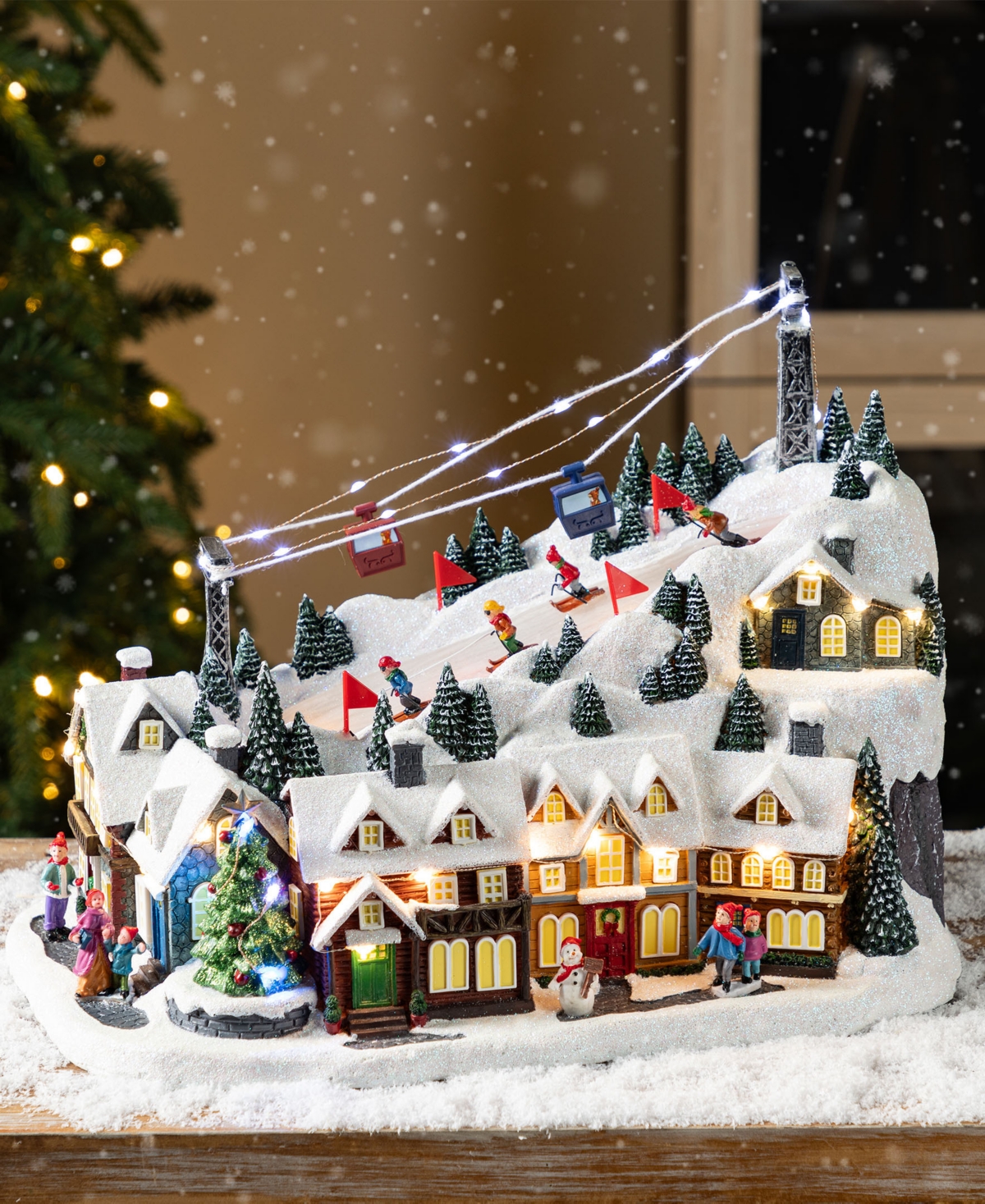 Glitzhome 16" Christmas Oversized Resin Lighted Musical Skiing Village In Multi