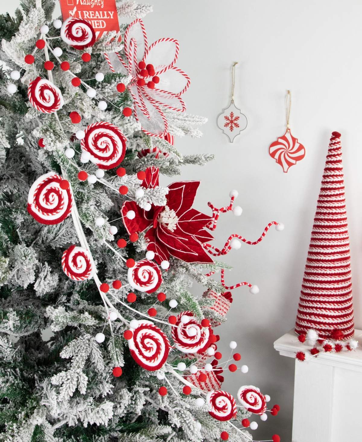 Northlight 30" Candy Cane Swirls and Pom Poms Christmas Garland