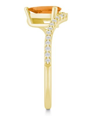 London Blue Topaz (1-1/20 ct. t.w.) and Diamond Ring (1/5 ct. t.w.) in 10k Yellow Gold