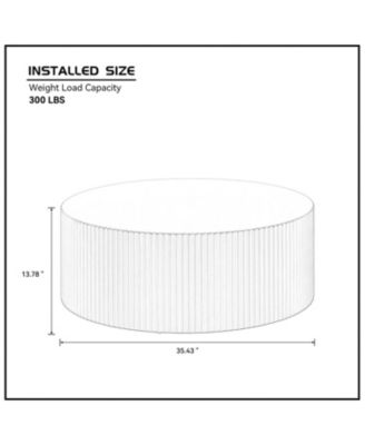 Sleek and Modern Round Coffee Table with Eye-Catching Relief Design Black