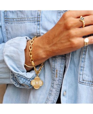 25mm Clover Charm with Micro Pave CZ Center On A Gold Plated Oval Chain Bracelet