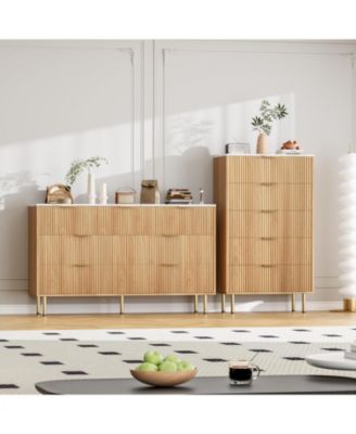 5-drawer dresser is a 47.9" tall wood piece with a fluted design and metal handles, designed as a functional chest of drawers