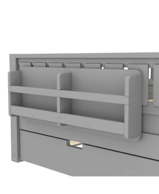 Full bed with bookshelves, staircase, safety rails, trundle