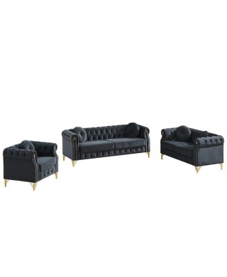 Velvet Chesterfield sofa with copper stud detailing & tufted buttons.