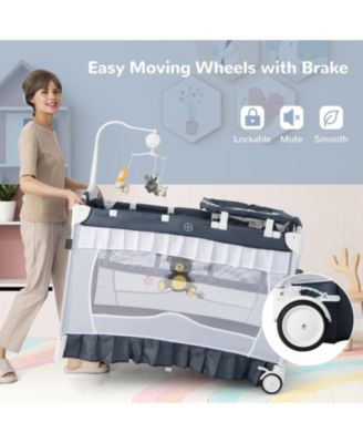 Baby 4-in-1 Convertible Bassinet with Changing Table, Music Box and Wheels