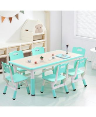 47 Inch Height Adjustable Kids Table and 6 Chair Set with Non Slip Legs and Graffiti Desktop