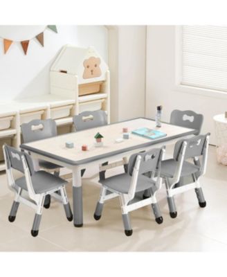 47 Inch Height Adjustable Kids Table and 6 Chair Set with Non-Slip Legs and Graffiti Desktop