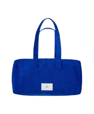 Free Blue Carolina Herrera Duffle Bag with any $131 Carolina Herrera Bad Boy men's fragrance and/or body collection purchase.