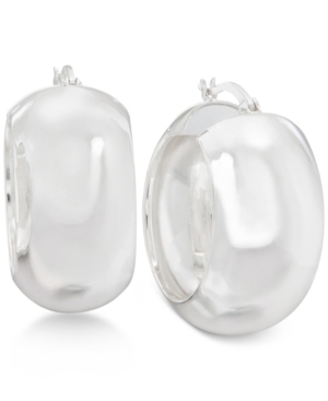 image of High-Polished Huggy Hoop Earrings in Sterling Silver