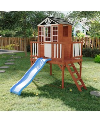 Wooden Kids Playhouse, Elevated Outdoor Game Cottage with Wave Slide, Step Ladder, High Dense Fence, Multi Function Play Space for Ages 3 10