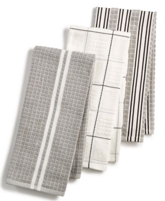 gray and white kitchen towels
