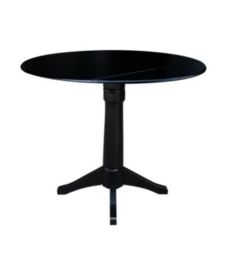 International Concept 42" Round Dual Drop Leaf Pedestal Table