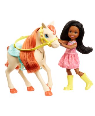 barbie doll and horse