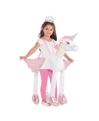 toddler riding unicorn