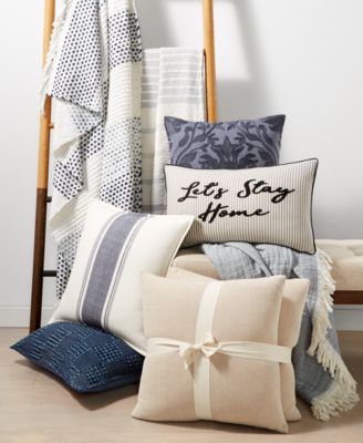white decorative bed pillows