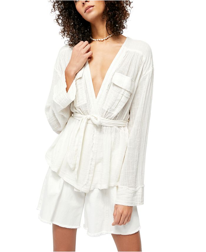 Belted wrap top outlet