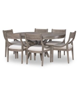 gray round dining table set for 6