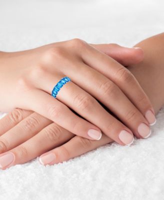 Blue Emerald Cut Cubic Zirconia Eternity Band in Rhodium Plated Sterling Silver