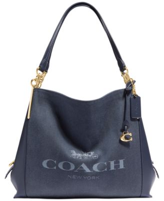 coach purse with horse and carriage logo