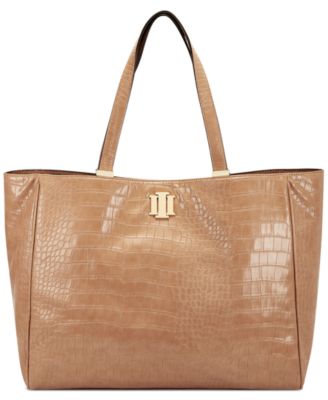 Photo 1 of INC International Concepts Michaela Tote , Created for Macy's
Extra large sized bag; 20"W x 12"H x 5-1/2"D 
6"L handles
Magnetic snap closure
Gold-tone exterior hardware, 1 back zip pocket
2 interior slip pockets, 1 zip pocket
Fits laptop
Created For Macy