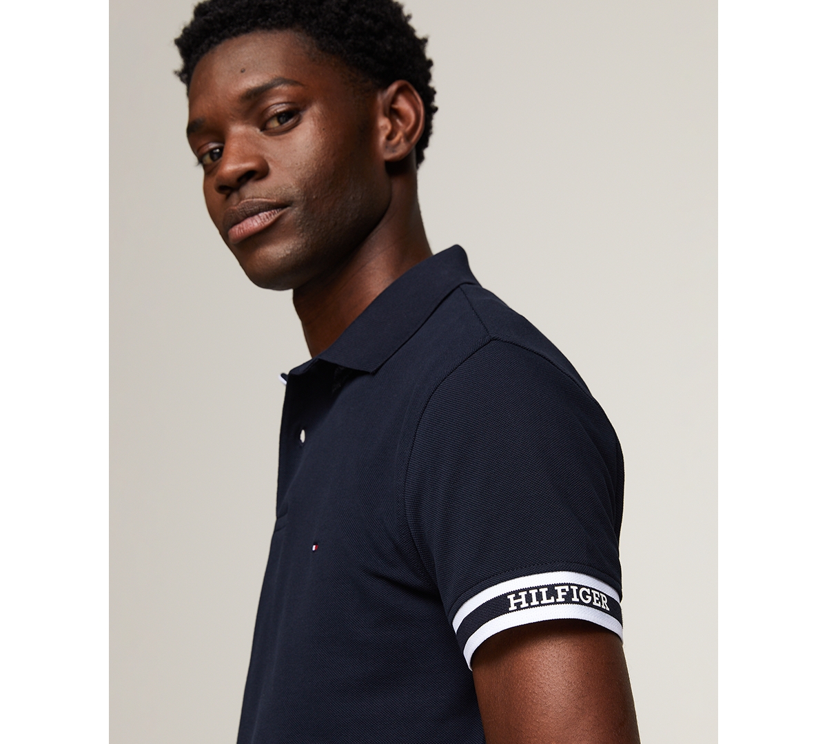 Tommy Hilfiger Men's Slim Fit Monotype Cuff Short Sleeve Polo Shirt