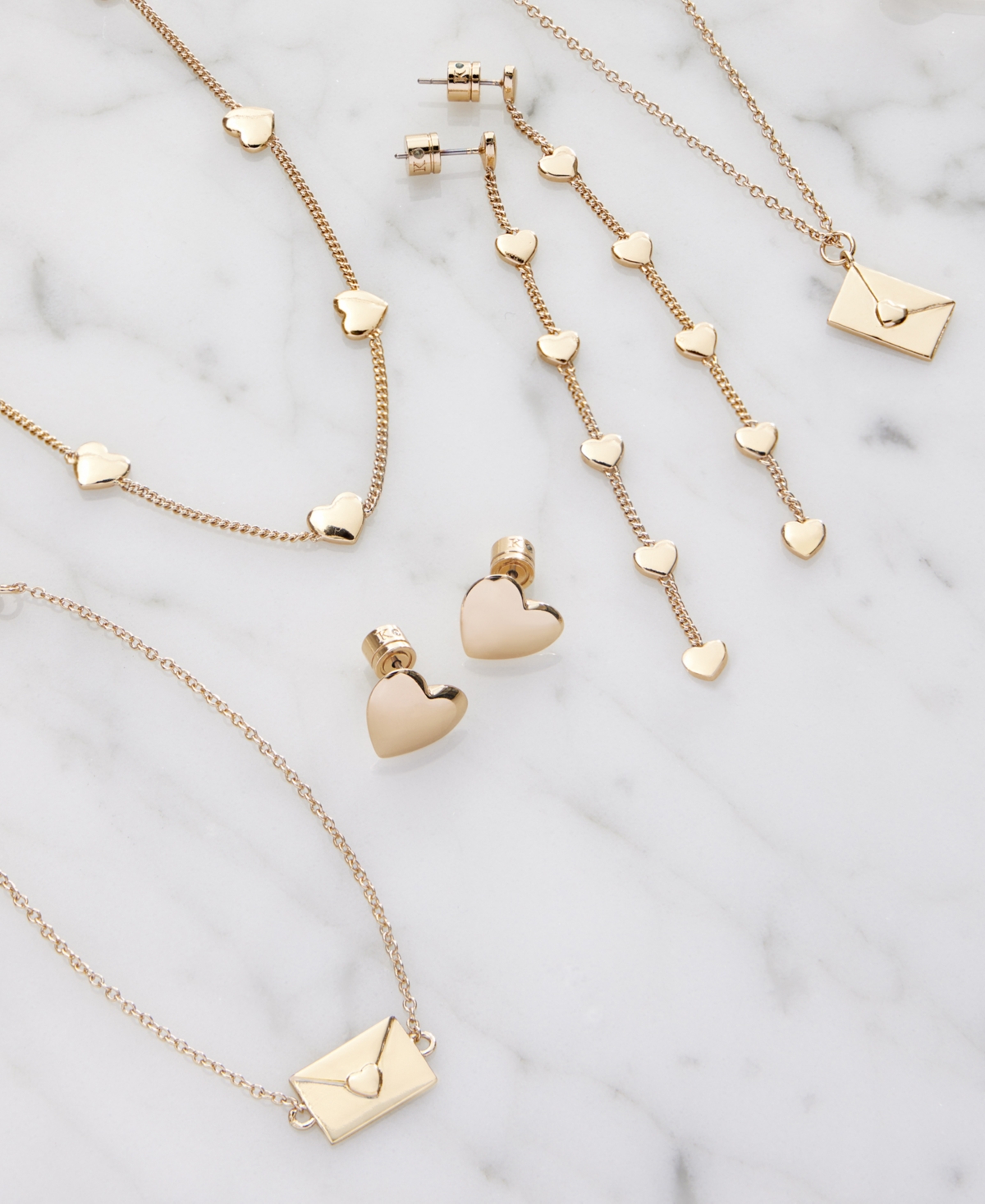 Shop Kleinfeld Gold-tone Heart Linear Statement Earrings