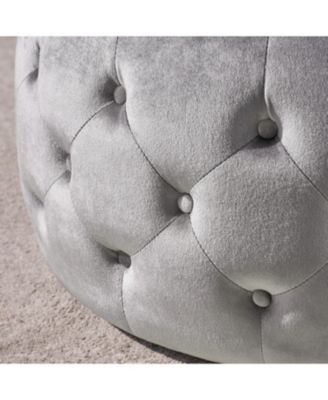 velvet design with diamond tufting and a tempered glass top is offered as a modern glam ottoman