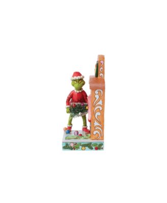 Grinch Pushing Sisal Tree Up Figurine