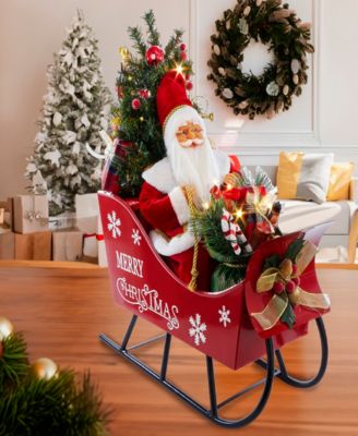 24-Inch Battery Operated Musical LED Santa in Metal Sleigh Table Piece
